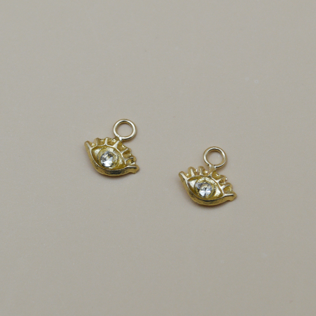 Dije ojito pestañas con zirconia natural - Oro 10K