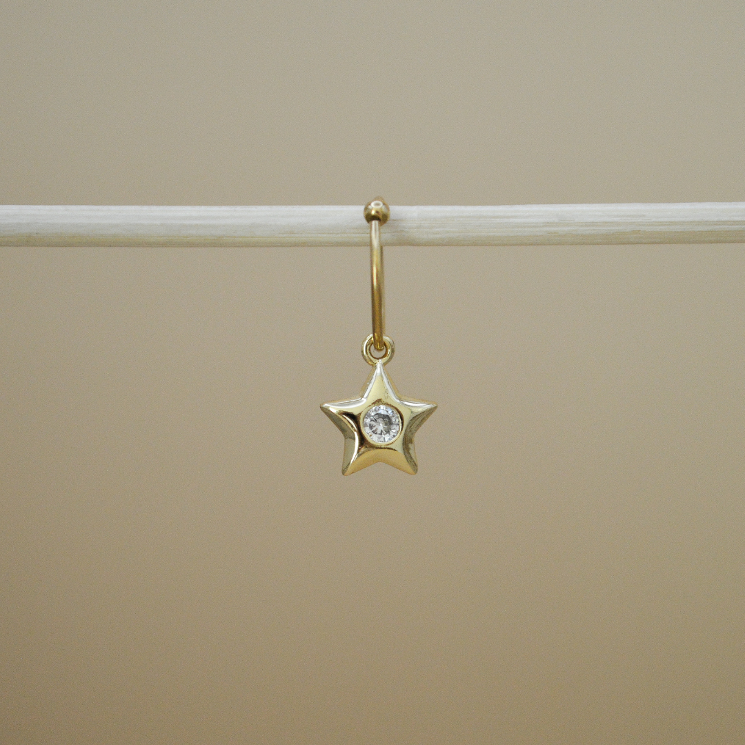 Piercing estrella zirconia al centro