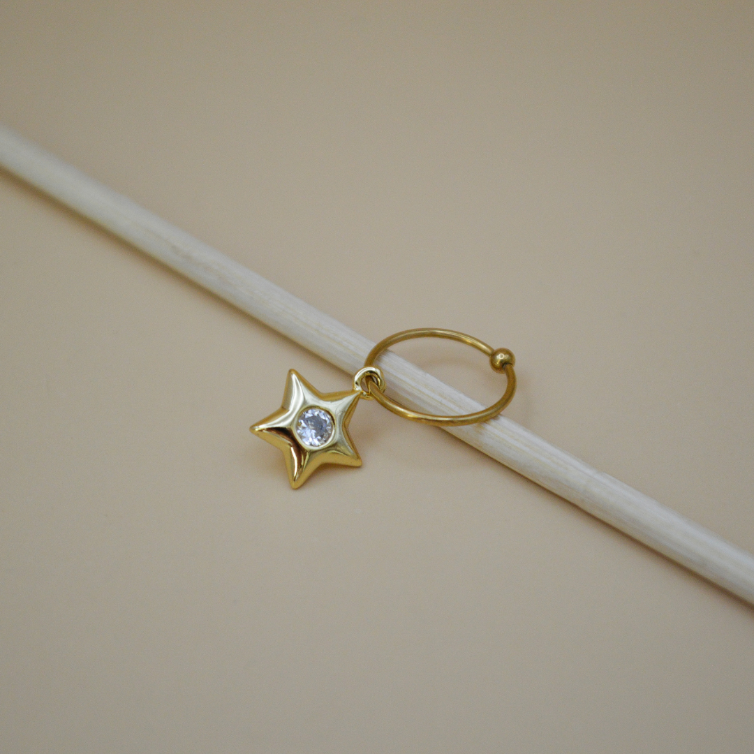 Piercing estrella zirconia al centro