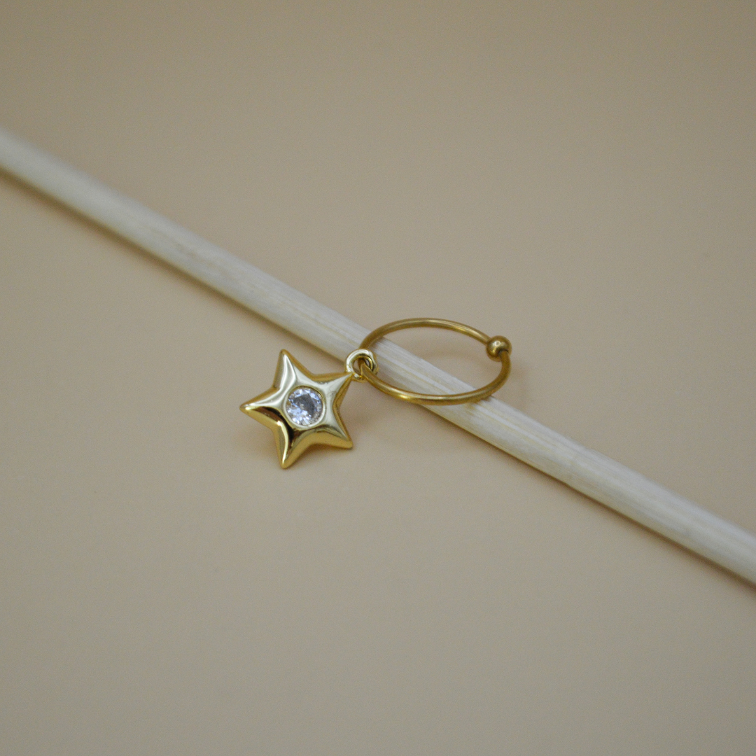 Piercing estrella zirconia al centro