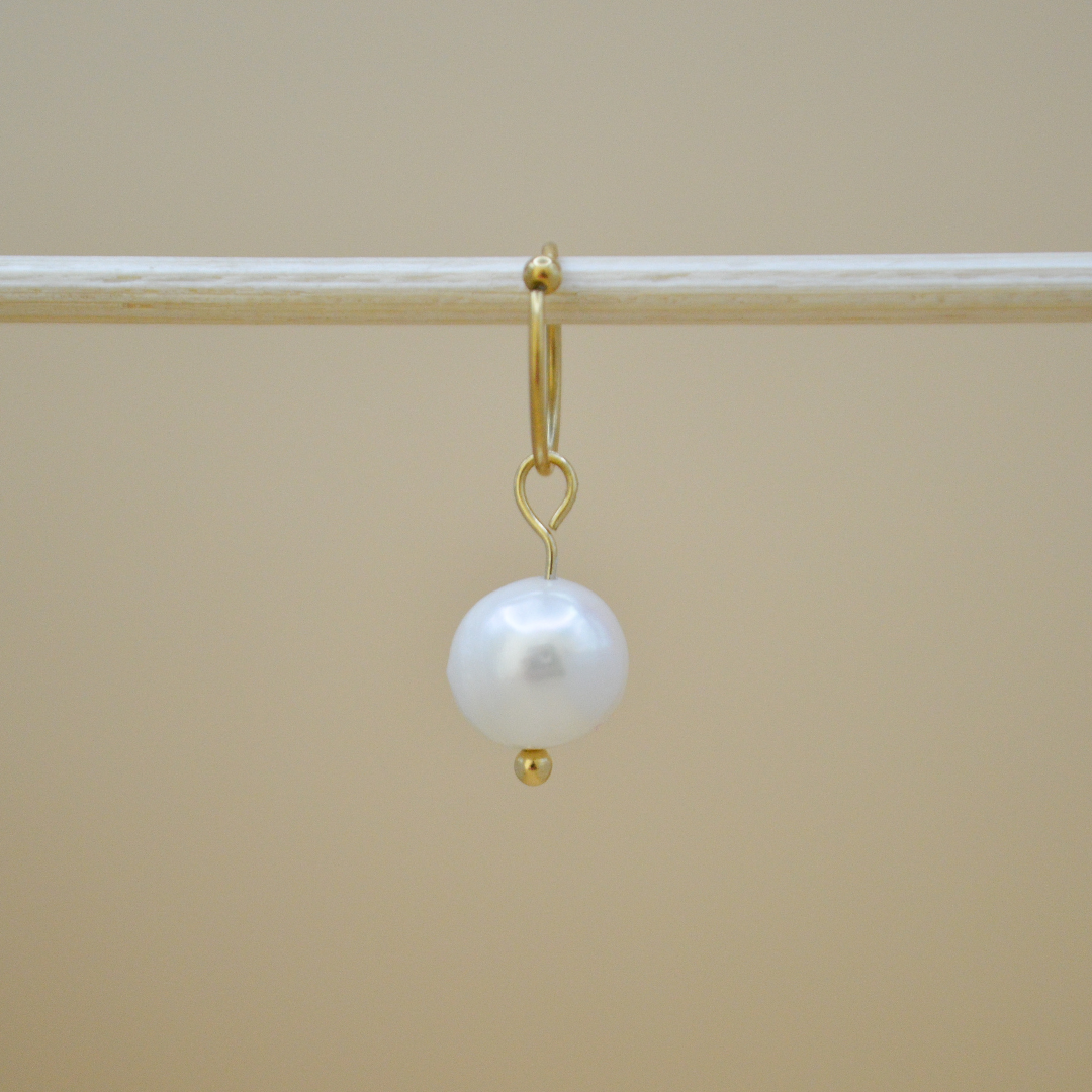 Piercing perla de río