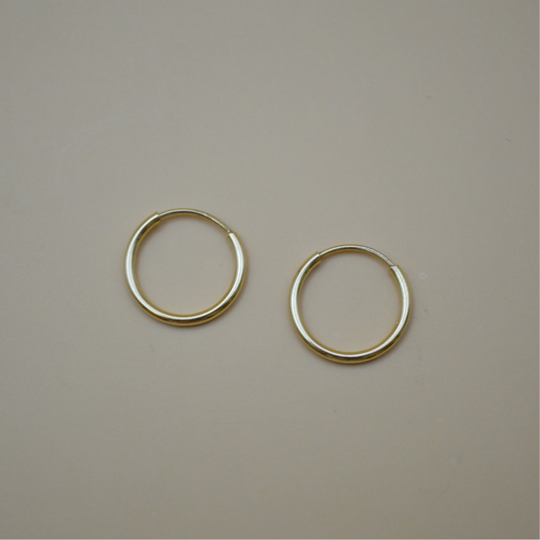 Arracada mini 0.8 cm - Oro 10K