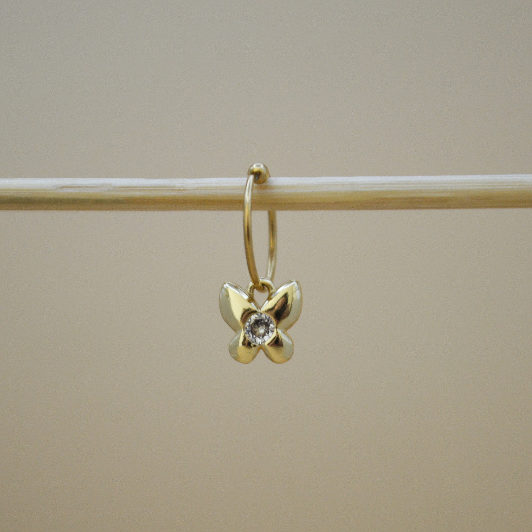 Piercing mariposa zirconia al centro