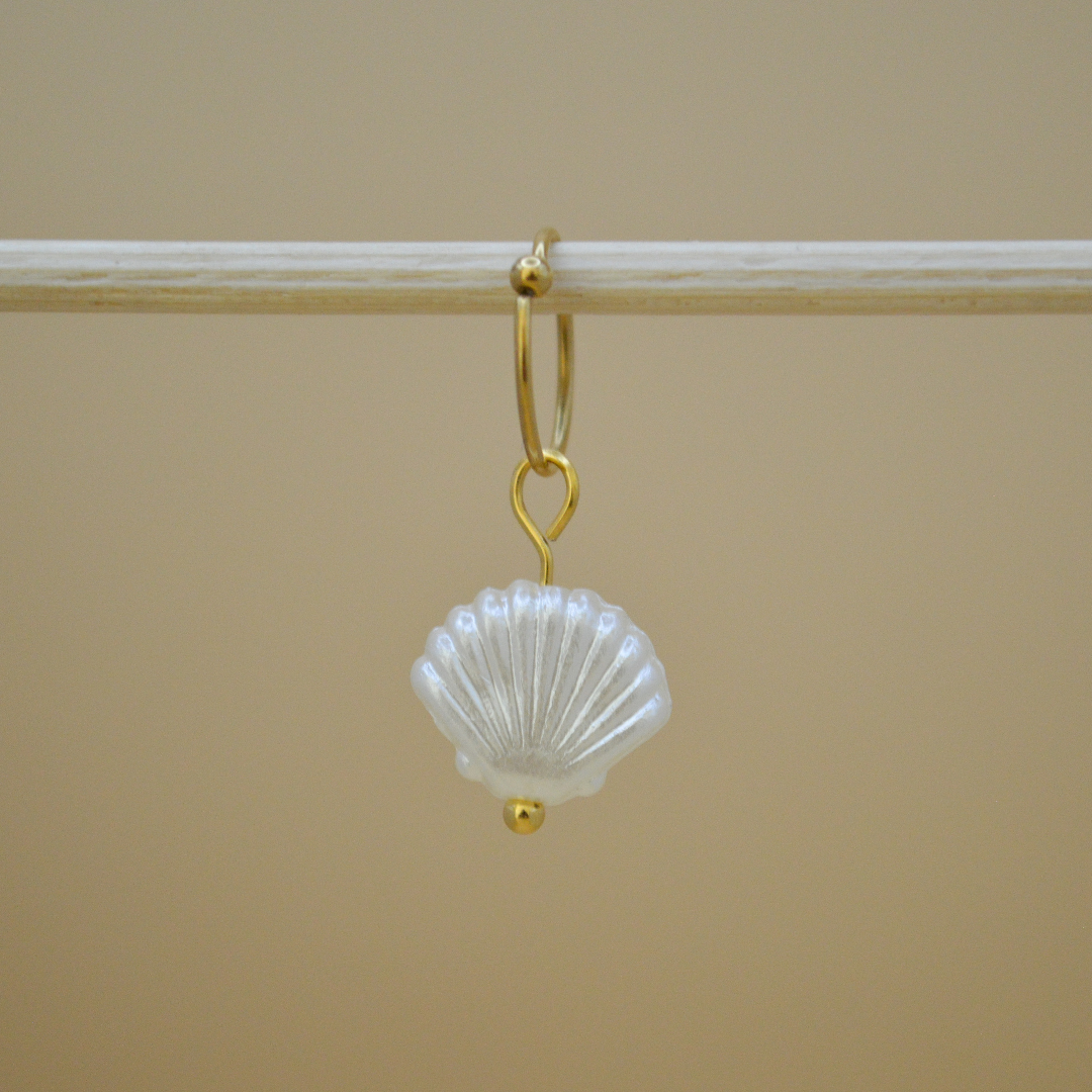 Piercing concha de mar beige