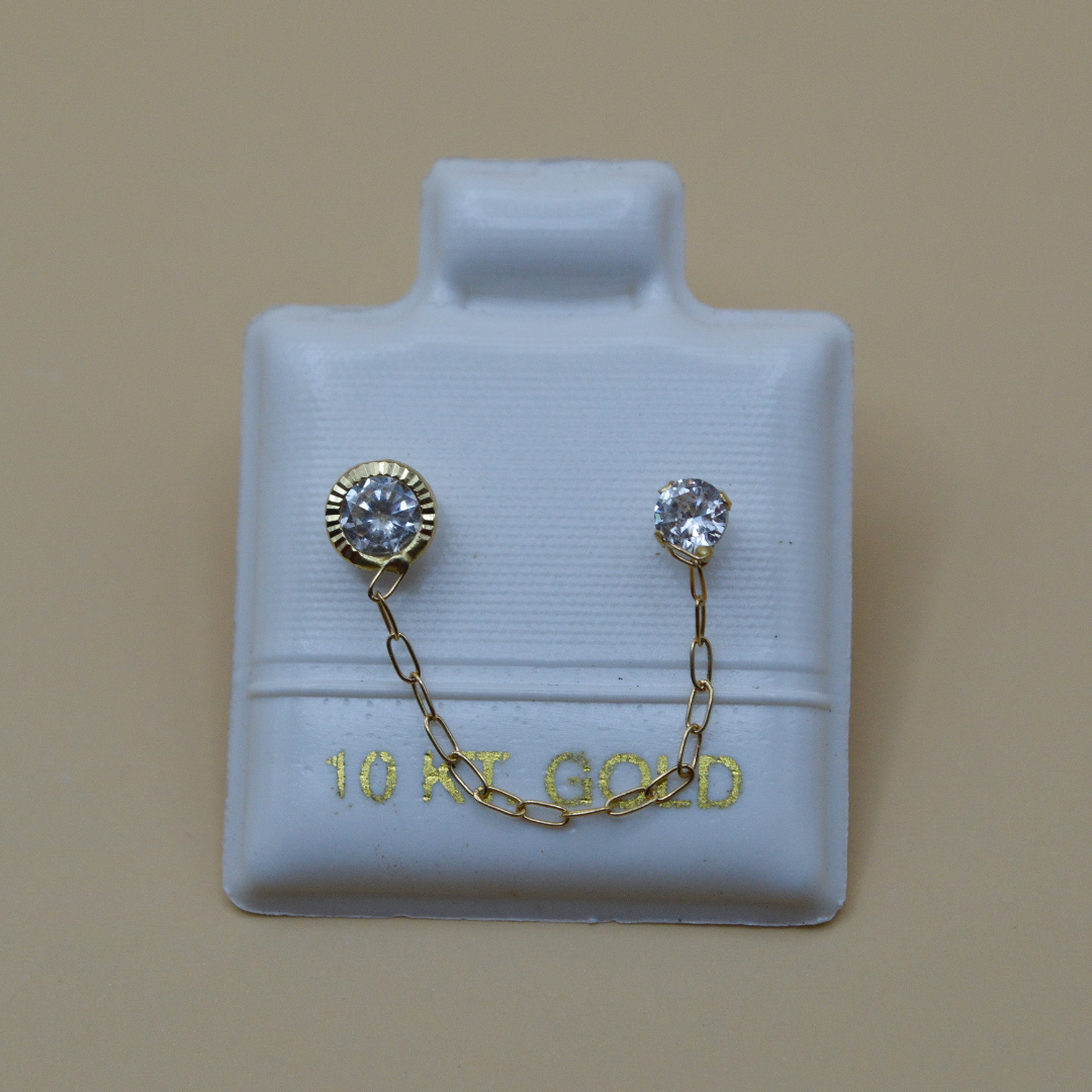 Broquel zirconia con bicel zirconia y cadena - Oro 10K