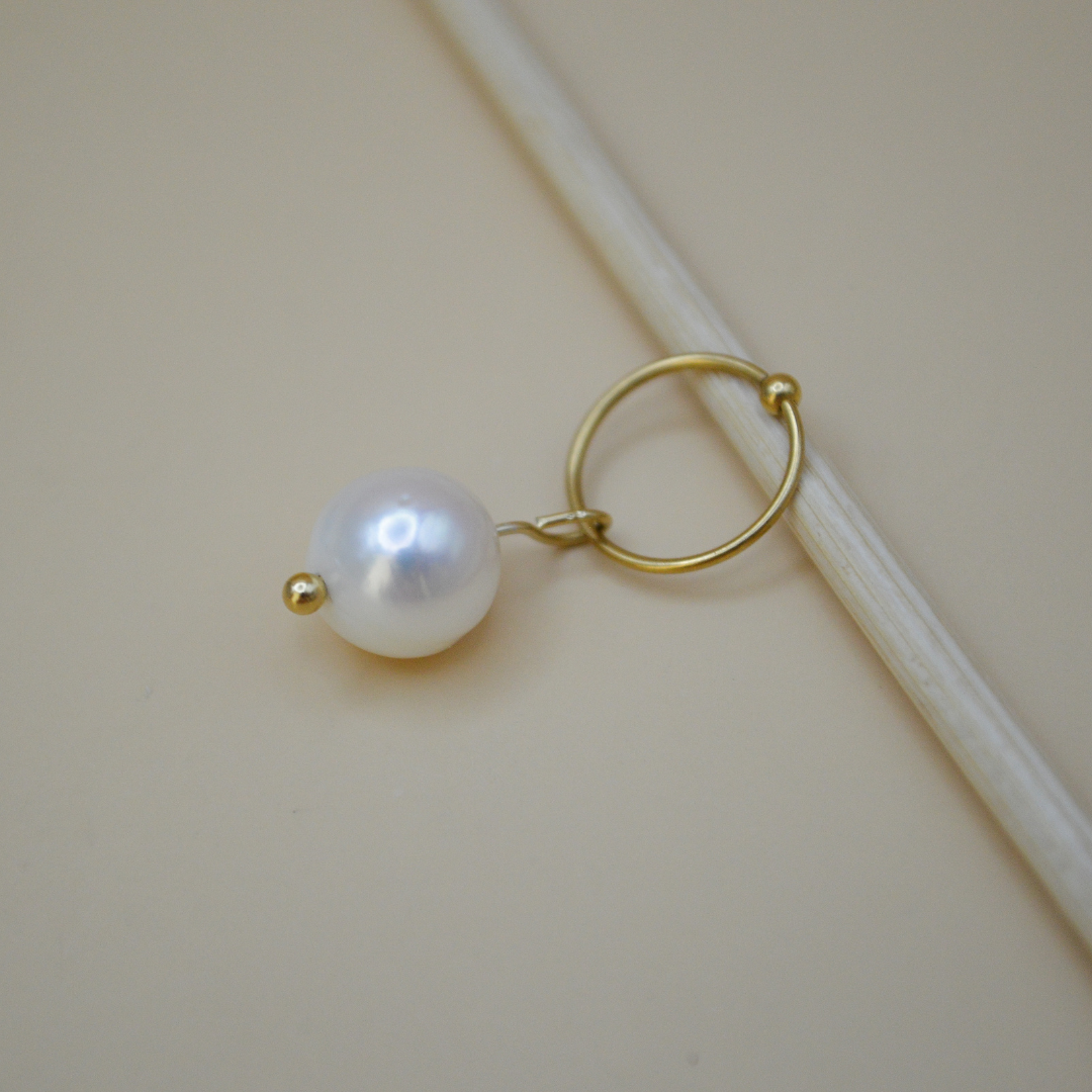 Piercing perla de río