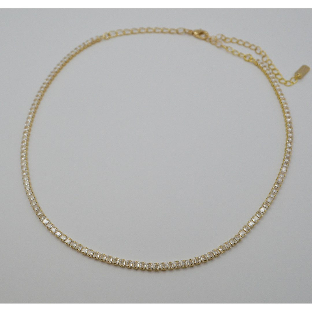 Juego zirconias gold (collar y aretes)