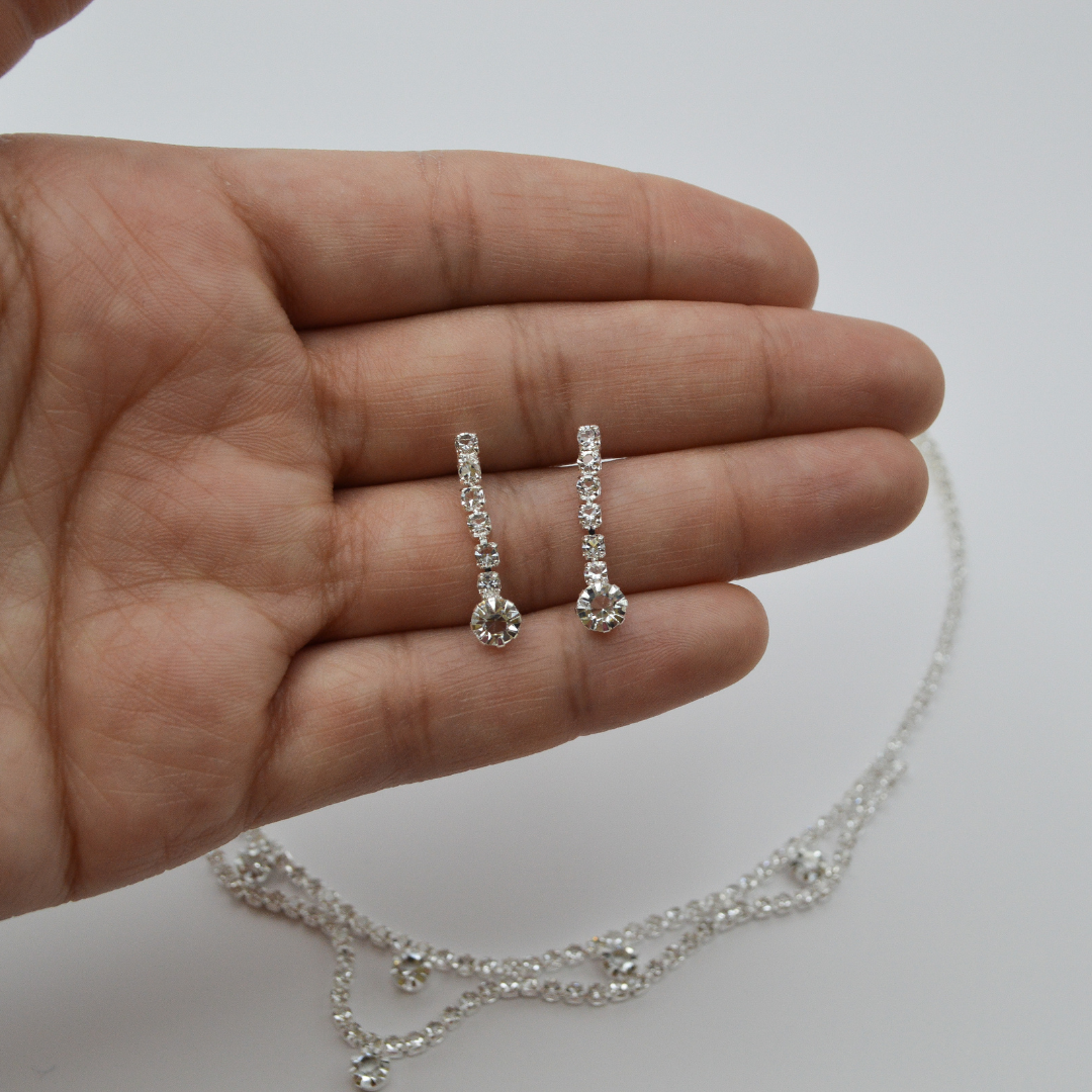 Juego zirconias nubes con zirconias (collar y aretes)