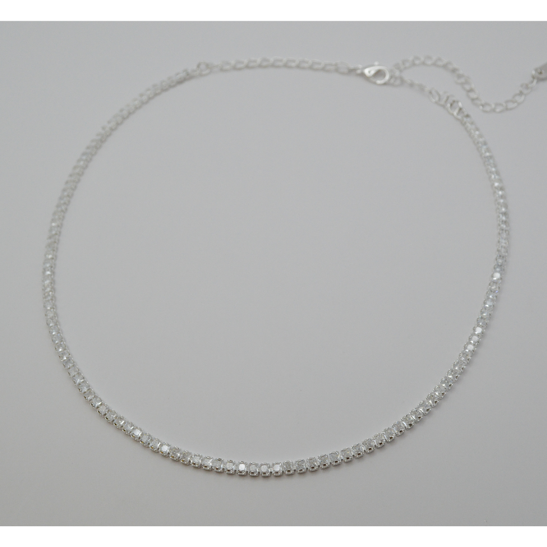 Juego zirconias silver (collar y aretes)