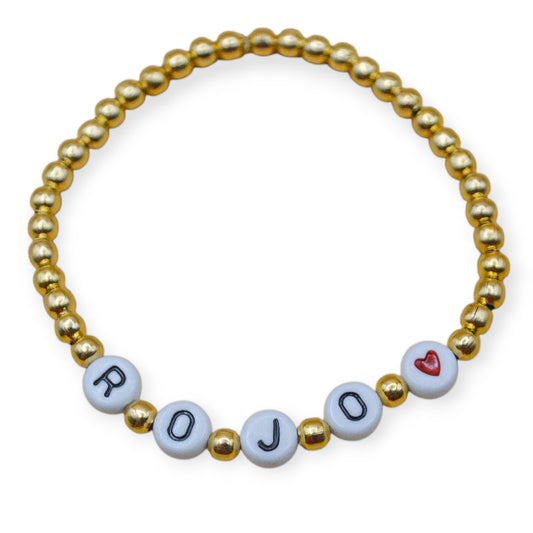 Pulsera personalizada bolitas gold y letras acrílicas