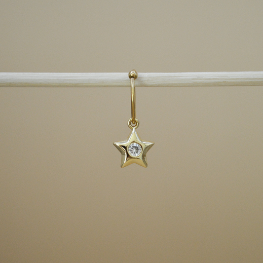 Piercing estrella zirconia al centro