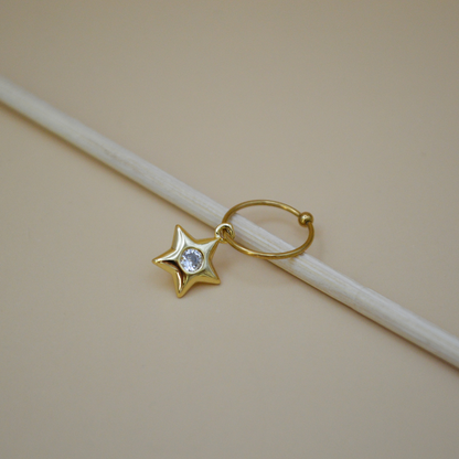Piercing estrella zirconia al centro