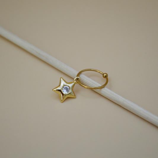 Piercing estrella zirconia al centro