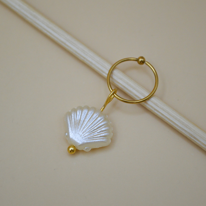 Piercing concha de mar beige