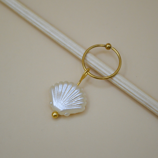 Piercing concha de mar beige