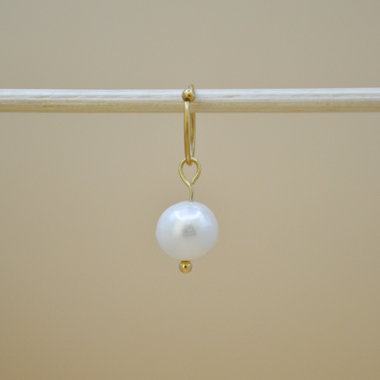 Piercing perla de río