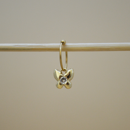 Piercing mariposa zirconia al centro
