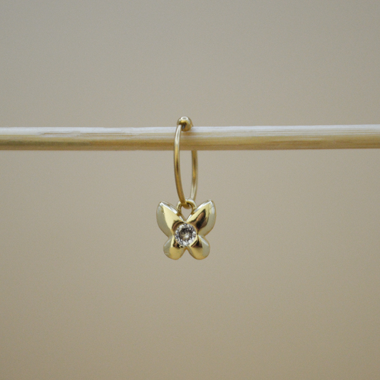 Piercing mariposa zirconia al centro