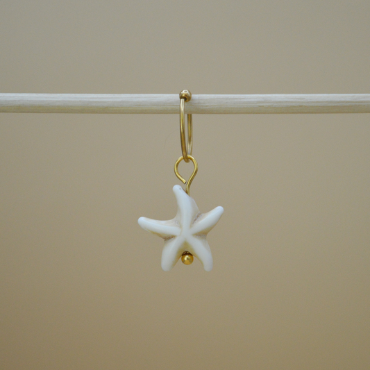 Piercing estrella de mar beige