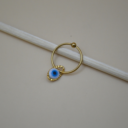 Piercing ojo turco azul/blanco ovalado