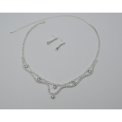 Juego zirconias nubes con zirconias (collar y aretes)