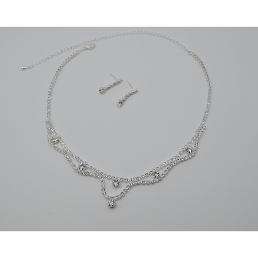 Juego zirconias nubes con zirconias (collar y aretes)